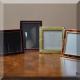 D30. 4 Enamel picture frames.